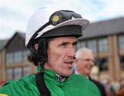 3 May 2011; Jockey Tony McCoy in the parade ring after he brought Shot From The Hip home to win the Evening Herald Champion Novice Hurdle. Punchestown Irish National Hunt Festival 2011, Punchestown, Co. Kildare. Picture credit: Barry Cregg / SPORTSFILE