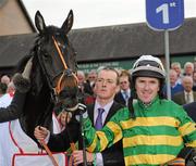 3 May 2011; Jockey Tony McCoy in the parade ring with Shot From The Hip after winning the Evening Herald Champion Novice Hurdle. Punchestown Irish National Hunt Festival 2011, Punchestown, Co. Kildare. Picture credit: Barry Cregg / SPORTSFILE