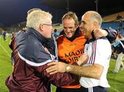 10 September 2011; Galway manager Anthony Cunningham, right, is congratulated by County Board Chairman Joe Byrne and selector Mattie Kenny after the final whistle. Bord Gais Energy GAA Hurling Under 21 All-Ireland 'A' Championship Final, Dublin v Galway, Semple Stadium, Thurles, Co. Tipperary. Picture credit: Dáire Brennan / SPORTSFILE