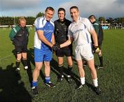 17 September 2011; Dublin legends captain Ciaran Whelan shakes hands with Rest of Ireland legends captain Darragh O Se in front of referee Gary McCormack before the game. Blue September Kilmacud Crokes All Ireland Football 7s 2011. Kilmacud Crokes GAA Club, Stillorgan, Dublin. Picture credit: Pat Murphy / SPORTSFILE
