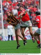 5 May 2002; Sean Og O'Hailpin, Cork in action against Andy Comerford, Kilkenny, Allianz National hurling League Final Division 1, Semple Stadium, Thurles, Co. Tipperary. Picture credit; Damien Eagers / SPORTSFILE