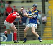 5 May 2002; Longford's Martin Coyle in action against Donagh Callan, Louth. Louth v Longford, Allianz National Hurling League Division 3 Final, Pairc Tailteann, Navan, Co. Meath. Picture credit; David Maher / SPORTSFILE