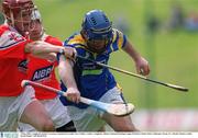 5 May 2002; Longford's Enda Corcoran is tackled by Louth's Ger Collins. Louth v Longford, Allianz National Hurling League Division 3 Final, Pairc Tailteann, Navan, Co. Meath. Picture credit; David Maher / SPORTSFILE