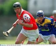 5 May 2002; Donagh Callan, Louth, in action against Martin Coyle, Longford. Louth v Longford, Allianz National Hurling League Division 3 Final, Pairc Tailteann, Navan, Co. Meath. Picture credit; David Maher / SPORTSFILE