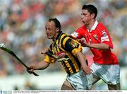 5 May 2002; Andy Comerford, Kilkenny, in action against Kieran Murphy, Cork. Kilkenny v Cork, Allianz National hurling League Final Division 1, Semple Stadium, Thurles, Co. Tipperary. Picture credit; Brian Lawless / SPORTSFILE