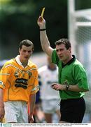 5 May 2002; Referee Seamus Roche issues Antrim's Liam Watson with a yellow card. Laois v Antrim, Allianz National hurling League Final Division 2, Semple Stadium, Thurles, Co. Tipperary. Picture credit; Damien Eagers / SPORTSFILE
