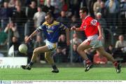 12 May 2002; Paul Barden, Longford, in action against Louth's Peter McGinnity. Louth v Longford, Leinster Senior Football Championship Round 1 Replay, Pairc Tailteann, Navan, Co. Meath. Picture credit; David Maher / SPORTSFILE