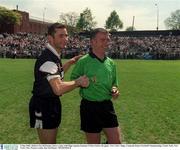 5 May 2002; Referee Pat McEnaney shares a joke with Sligo captain Eamonn O'Hara before the game. New York v Sligo, Connacht Senior Football Championship, Gaelic Park, New York, USA. Picture credit; Ray McManus / SPORTSFILE