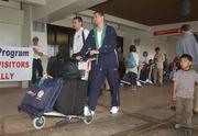 18 May 2002; Republic of Ireland players Shay Given and Roy Keane on arrival at Saipan International Airport in preparation tor the World Cup 2002 in Japan and Korea. cup2002. Soccer. Picture credit; David Maher / SPORTSFILE *EDI*