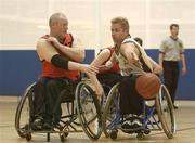 18 May 2002; Michael Cunningham, Panthers, left, in action against Crusaders' Aubrey Bingham. Panthers, Dublin v Crusaders, Belfast, Paddy Byrne Wheelchair Basketball Cup Final, University of Limerick, Limerick. Picture credit; Brendan Moran / SPORTSFILE *EDI*