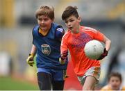 21 April 2017; Edhran Keen, representing Clontibret GAA Club, Co Monaghan, in action against Eoghan Molloy, representing , Co Monaghan, during the Go Games Provincial Days in partnership with Littlewoods Ireland Day 7 at Croke Park in Dublin. Photo by Cody Glenn/Sportsfile