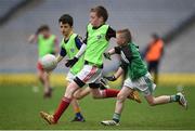 21 April 2017; Oisín  Brady, representing St Finbar's GAA Club, Co Cavan, in action against Evan Maguire, representing Cootehill Celtic GAA Club, Co Cavan, during the Go Games Provincial Days in partnership with Littlewoods Ireland Day 7 at Croke Park in Dublin. Photo by Cody Glenn/Sportsfile