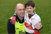 21 April 2017; Henry Downey, who captained the 1993 All-Ireland winning Derry team, hugs his son Daíre Downey, age 12, representing the Lavey GAA Club, and Derry GAA For All Team, after scoring a goal and two points during the Go Games Provincial Days in partnership with Littlewoods Ireland Day 7 at Croke Park in Dublin. Photo by Cody Glenn/Sportsfile