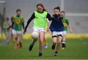 21 April 2017; Sophie Daly, representing St Finbar's GAA Club, Co Cavan, in action against Caolán Fagan, representing Mullahoran GAA Club, Co Cavan, during the Go Games Provincial Days in partnership with Littlewoods Ireland Day 7 at Croke Park in Dublin. Photo by Cody Glenn/Sportsfile
