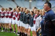 9 October 2011; Westmeath manager Peter Leahy and his players stand for the National Anthem. TG4 All-Ireland Ladies Intermediate Football Championship Final Replay, Cavan v Westmeath, Croke Park, Dublin. Picture credit: Brian Lawless / SPORTSFILE