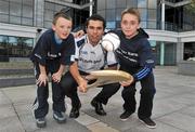 12 October 2011; Pictured at Ulster Bank Headquarters in Dublin is, Sean Og O hAilpin, Ulster Bank Gaa Force Ambassador with St Joseph O'Connell Boys GAA Club members Josh Doran, age 10, from East Wall, left, and Dillon McCarthy, age 10, from Crinan Strand. St Joseph O'Connell Boys GAA Club in Dublin received a major boost as Ulster Bank announced the winners of ‘Ulster Bank GAA Force’ – a major club focused initiative supporting local GAA clubs by giving them the opportunity to refurbish and upgrade their facilities. Ulster Bank GAA Force was introduced this summer to coincide with Ulster Bank’s sponsorship of the GAA Football All-Ireland Championships. St Joseph O'Connell Boys GAA Club was awarded a support package worth €5,000 as one of four provincial runners-up in the Ulster Bank GAA Force initiative. Ulster Bank, George’s Quay, Dublin. Picture credit: Brian Lawless / SPORTSFILE