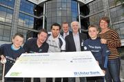 12 October 2011; Pictured at Ulster Bank Headquarters in Dublin are Sean Og O hAilpin, Ulster Bank Gaa Force Ambassador, and Ronan Moran, Area Manager Dublin Central, Ulster Bank, fourth from left, with St Joseph O'Connell Boys GAA Club members, from left, Josh Doran, age 10, Paul Dixon, Manager Senior 2nd team, Johnny Sheridan, U12's Manager, Dillan McCarthy, age 10, and Ciara Harte, U12's manager. St Joseph O'Connell Boys GAA Club in Dublin received a major boost as Ulster Bank announced the winners of ‘Ulster Bank GAA Force’ – a major club focused initiative supporting local GAA clubs by giving them the opportunity to refurbish and upgrade their facilities. Ulster Bank GAA Force was introduced this summer to coincide with Ulster Bank’s sponsorship of the GAA Football All-Ireland Championships. St Joseph O'Connell Boys GAA Club was awarded a support package worth €5,000 as one of four provincial runners-up in the Ulster Bank GAA Force initiative. Ulster Bank, George’s Quay, Dublin. Picture credit: Brian Lawless / SPORTSFILE