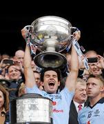 18 September 2011; Cian O'Sullivan, Dublin, lifts the Sam Maguire Cup. GAA Football All-Ireland Senior Championship Final, Kerry v Dublin, Croke Park, Dublin. Picture credit: Ray McManus / SPORTSFILE