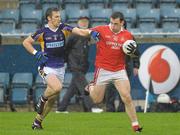 15 October 2011; John O'Loughlin, St Brigid’s, in action against Brian McGrath, Kilmacud Crokes. Dublin County Senior Football Championship, Round 4, Kilmacud Crokes v St Brigid’s, Parnell Park, Dublin. Photo by Sportsfile