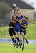 16 October 2011; Anthony Johnson and John Crimmins, hidden, Dunshaughlin, in action against Michael Byrne and Conor Gillespie, right, Summerhill. Meath County Senior Football Championship Final Replay, Dunshaughlin v Summerhill, Pairc Tailteann, Navan, Co. Meath. Picture credit: Pat Murphy / SPORTSFILE