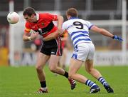 16 October 2011; Shane Beston, UCC, in action against Sean Dineen, Castlehaven. Cork County Senior Football Championship Final, UCC v Castlehaven, Pairc Ui Chaoimh, Cork. Picture credit: Stephen McCarthy / SPORTSFILE