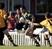 21 October 2003; Steven McDonnell, Ireland, in action against Western Australia's Josh Parsons. Foster's International Rules, Preparation match, Western Australia v Ireland, Swan Districts Football Club, Bassendean Oval, Bassendean, Perth, Western Australia. Picture credit; Ray McManus / SPORTSFILE