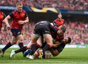 22 April 2017; Tommy O’Donnell of Munster is tackled by Billy Vunipola and Alex Goode of Saracens during the European Rugby Champions Cup Semi-Final match between Munster and Saracens at the Aviva Stadium in Dublin. Photo by Brendan Moran/Sportsfile