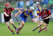 16 October 2011; Kieran Geary, Tallow, in action against David O'Sullivan, left, and Brian O'Sullivan, Ballygunner. Waterford County Senior Hurling Championship Final, Ballygunner v Tallow, Walsh Park, Co. Waterford. Picture credit: Brian Lawless / SPORTSFILE
