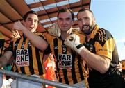 16 October 2011; Crossmaglen Rangers players from left, Aaron Kernan, David McKenna and Paul Hearty celebrate after the game. Armagh County Senior Football Championship Final, Crossmaglen Rangers v Ballymacnab Round Towers, Morgan Athletic Grounds, Armagh. Picture credit: Oliver McVeigh / SPORTSFILE