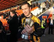 16 October 2011; Oisin McConville, Crossmaglen Rangers, with the Gerry Fagan cup after receiving his 15th Armagh winners medal. Armagh County Senior Football Championship Final, Crossmaglen Rangers v Ballymacnab Round Towers, Morgan Athletic Grounds, Armagh. Picture credit: Oliver McVeigh / SPORTSFILE