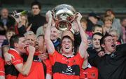 16 October 2011; Sean Kiely, UCC, lifts the Andy Scannell Cup. Cork County Senior Football Championship Final, UCC v Castlehaven, Pairc Ui Chaoimh, Cork. Picture credit: Stephen McCarthy / SPORTSFILE