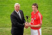 18 October 2011; Days before he flies out to Australia to play with the International Rules team, Cork forward Aidan Walsh has been voted the 2011 Bord Gáis Energy Breaking Through Player of the Year. The Kanturk clubman was picked from a shortlist that included heavy hitters Liam Rushe and Shane Dowling to claim the €1,000 prize voucher. Also in the running were Galway trio Niall O’Donoghue, Niall Burke and Barry Daly and Shane Dowling’s Limerick team mate Declan Hannon. The Breaking Through Player of the Year award recognises the overall stand out player of the 2011 Championship and is voted for by a panel made up of Bord Gáis Energy Sport Sponsorship Manager and newly appointed Cork selector, Ger Cunningham, RTÉ’s Marty Morrissey, Micheál O Domhnaill of TG4, U-21 All-Ireland winner Joe Canning and former Waterford great Ken McGrath. Pictured at the presentation are Bord Gáis Energy Sport Sponsorship Manager and newly appointed Cork selector, Ger Cunningham and Aidan Walsh. CIT GAA Grounds, Cork. Picture credit: Pat Murphy / SPORTSFILE
