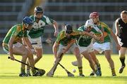 16 October 2011; Martin Sadlier, centre, Padraig Heffernan, left, and Joey O'Keeffe, right, Clonoulty-Rossmore, in action against David Collins, left, and Kevin Butler, Drom & Inch. Tipperary County Senior Hurling Championship Final, Drom & Inch v Clonoulty-Rossmore, Semple Stadium, Thurles, Co. Tipperary. Picture credit: Diarmuid Greene / SPORTSFILE