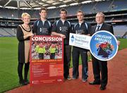 19 October 2011; The GAA has teamed up with brain injury specialists Acquired Brain Injury Ireland to back their Mind Your Head campaign; educating players about the signs and symptoms of Concussion, through an Educational Concussion Poster Campaign. This poster campaign will be distributed to over 1800 GAA clubs throughout the country, reaching out to all players of every age and level. Present at the launch are ABI Ireland CEO Barbara O’ Connell, with, from left to right, Dublin football players and ABI Ireland Ambassadors Michael Darragh Macauley, Rory O’Carroll, Dr. Danny Mulvihill, Chairman of the GAA Medical Committee, and Dublin footballer Paul Griffin. GAA and ABI Ireland Launch Concussion Awareness Campaign, Croke Park, Dublin. Picture credit: David Maher / SPORTSFILE