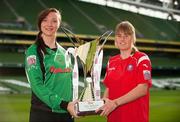 20 October 2011; Minister of State for Tourism and Sport, Michael Ring, today launched the inaugural Bús Éireann Women's National League which will commence on Sunday November 13th. Captain of Peamount United Ladies FC Louise Quinn, left, and captain of Cork Women's Football Club Emma Farmer, right, hold the league trophy in attendance at a Bus Éireann Women’s National League Captains photocall. Aviva Stadium, Lansdowne Road, Dublin. Picture credit: Barry Cregg / SPORTSFILE