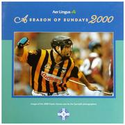 This 133 page hardback coffee table book (300mm x 300mm) is a collection of images of the 2000 Gaelic Games year by the Sportsfile photographers.                With text by Irish Times journalist, Tom Humphries, it is a treasured record of the 2000 GAA season to be savoured by players, spectators and enthusiasts everywhere.                 A Season of Sundays 2000 is a stocktaking. A look back at the images of the Gaelic games year, winners, losers, good times and bad and some of the flavour that lies between. These pictures are a frozen moment of a people's obsession.