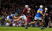 23 April 2017; Jason Flynn of Galway shoots past James Barry, 3 , and Cathal Barrett of Tipperary to score a goal early in second half during the Allianz Hurling League Division 1 Final match between Galway and Tipperary at Gaelic Grounds, in Limerick. Photo by Ray McManus/Sportsfile