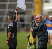 23 April 2017; Galway manager Micheal Donoghue makes a point to linesman James McGrath near the end of the Allianz Hurling League Division 1 Final match between Galway and Tipperary at Gaelic Grounds, in Limerick. Photo by Ray McManus/Sportsfile