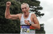 23 April 2017; Ken Divine from St. Finbarr's AC, Co. Cork, celebrates winning the Master Men's over 50 relay race during Irish Life Health National Road Relays at Raheny Village, in Dublin. Photo by Tomás Greally/Sportsfile