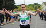 23 April 2017; John Dunne, Raheny Shamrock AC, celebrates winning the Master Men's over35 relay race, during the Irish Life Health National Road Relays at Raheny Village, in Dublin. Photo by Tomás Greally/Sportsfile