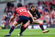 22 April 2017; Alex Goode of Saracens in action against Tyler Bleyendaal of Munster during the European Rugby Champions Cup Semi-Final match between Munster and Saracens at the Aviva Stadium in Dublin. Photo by Ramsey Cardy/Sportsfile