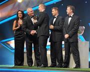 21 October 2011; Kilkenny's Henry Shefflin is presented with his 10th All Star award by Uachtarán CLG Criostóir Ó Cuana, in the company of Dave Sheeran, Managing Director, Opel Ireland and Dessie Farrell, Chief Executive of the GPA, at the GAA GPA All-Star Awards 2011 sponsored by Opel. National Convention Centre, Dublin. Picture credit: Brendan Moran / SPORTSFILE