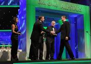 21 October 2011; Dublin's Stephen Cluxton is greeted by Dave Sheeran, Managing Director, Opel Ireland, before receiving his award from Uachtarán CLG Criostóir Ó Cuana at the GAA GPA All-Star Awards 2011 sponsored by Opel. National Convention Centre, Dublin. Picture credit: Brendan Moran / SPORTSFILE