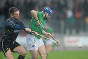 22 October 2011; Eoin Kelly, Ireland, in action against Norman Campbell, Scotland. 2011 Senior Hurling / Shinty International 1st Test, Ireland v Scotland, Athy, Co. Kildare. Picture credit: Matt Browne / SPORTSFILE