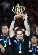 23 October 2011: New Zealand's Richie McCaw holds the Webb Ellis trophy aloft after beating France in their Rugby World Cup Final match. 2011 Rugby World Cup Final, New Zealand v France, Eden Park, Auckland, New Zealand. Picture credit: John Cowpland / SPORTSFILE