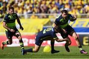 23 April 2017; Robbie Henshaw of Leinster is tackled by Camille Lopez of ASM Clermont Auvergne during the European Rugby Champions Cup Semi-Final match between ASM Clermont Auvergne and Leinster at Matmut Stadium de Gerland in Lyon, France. Photo by Ramsey Cardy/Sportsfile
