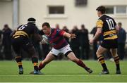 23 April 2017; Bryan Byrne of Clontarf in action against Elie Mundu, left, and Alan Tynan of Young Munster during the Ulster Bank League Division 1A semi-final match between Clontarf and Young Munster at Castle Avenue, Clontarf, in Dublin. Photo by Seb Daly/Sportsfile