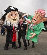 25 April 2017; RTÉ Sports Broadcaster Marty Morrissey battles some pirates as he arrives at Punchestown Racecourse in Naas, Co. Kildare. Photo by Cody Glenn/Sportsfile