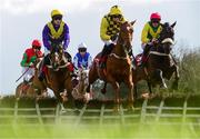 25 April 2017; Cilaos Emery, left, with David Mullins up, jump the first alongside Melon, centre, with Ruby Walsh up, who finished second, and Pingshou, right, with Davy Russell up, who finished third, on their way to winning the Herald Champion Novice Hurdle at Punchestown Racecourse in Naas, Co. Kildare. Photo by Cody Glenn/Sportsfile