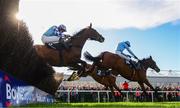 25 April 2017; Un De Sceaux, with Ruby Walsh up, who finished second, jump the last ahead of eventual winner Fox Norton, 2, with Robbie Power up, and God's Own, with Adrian Heskin up, during the BoyleSport Champion Steeplechase at Punchestown Racecourse in Naas, Co. Kildare. Photo by Cody Glenn/Sportsfile